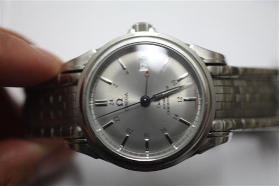 A gentlemans modern stainless steel Omega De Ville Co-Axial GMT Automatic Chronometer wrist watch,